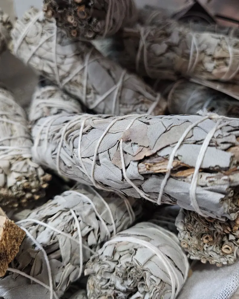 Several dried white sage bundles